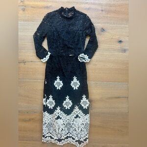 Alexis Black and White Sheath Dress with Bishop Sleeves